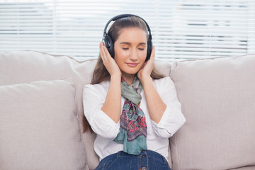 Peaceful cute model listening to music