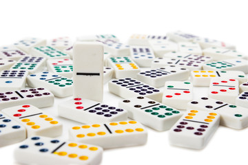 Fototapeta na wymiar Stand out from the crowd. Blank dominos is in focus.