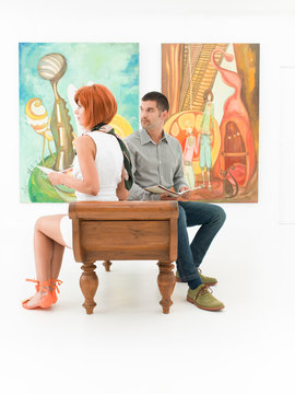 couple admiring artworks