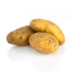 Group of potatoes isolated over white background
