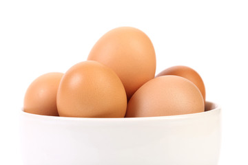 Bowl with brown eggs. Fragment.