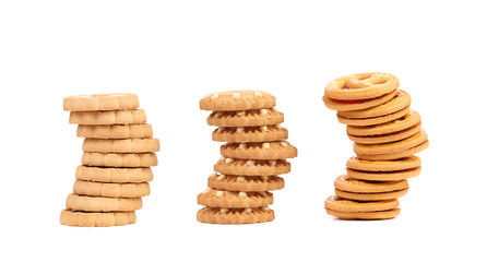 Three stacks of different biscuits.
