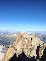 Man on top of a mountain