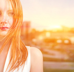 Young beautiful woman staring at camera.