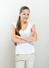 Beautiful smiling business woman standing.