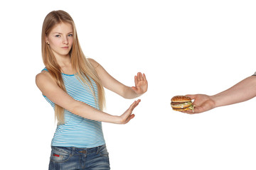 Discontent young female refusing fast food