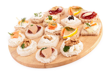 assortment of canapes, toast