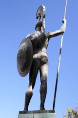 Statue of homers hero Achilles a greek warrior from the trojan war with shield armour and spear