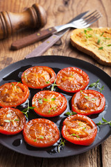 baked tomatoes with herbs and olive oil