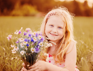 beautiful girl with flowers outdoor