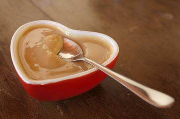Dulce de leche on heart shape bowl