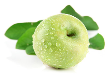 Juicy green apple with leaves, isolated on white