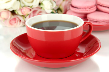 Coffee and macaroons close-up