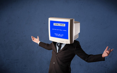 Person with a monitor head and fatal error blue screen on the di