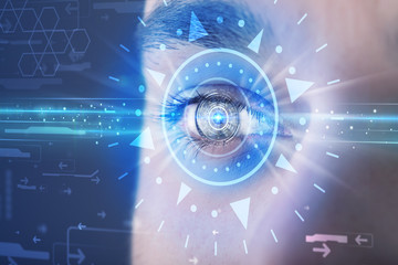 Cyber man with technolgy eye looking into blue iris