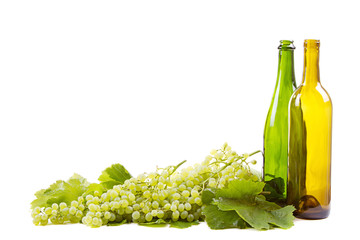 Fototapeta premium grapes and bottles on white