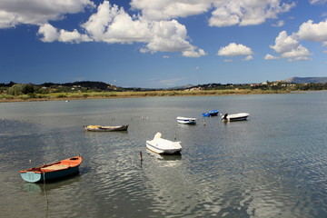 Fototapeta na wymiar Small Fishing boats moored in bay 