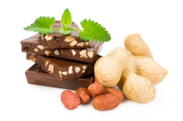 chocolate with peanuts and fresh mint leaves