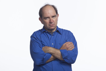 Upset man with arms crossed, horizontal