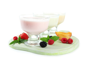 Delicious yogurt with fruit and  berries isolated on white