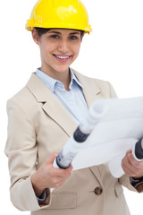 Smiling young architect holding plan