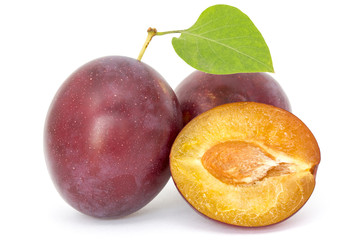 Fresh plums with leaf