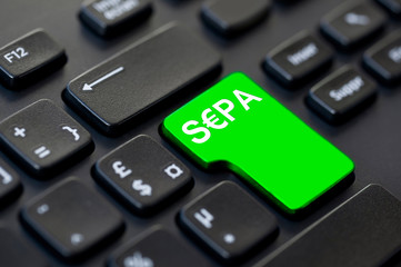 Mot SEPA, espace unique de paiement en euros, transfert en Europe, écrit sur un touche de clavier...