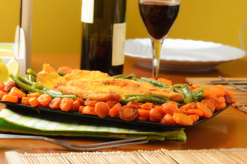 Pollo impanato con verdure