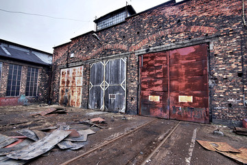 Industrial buildings covered in rust and patina