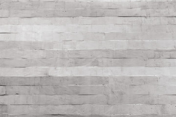 Texture of gray concrete wall with blocks