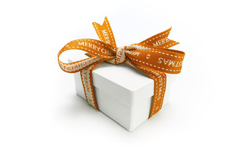 Christmas present wrapped with a gold ribbon and bow.