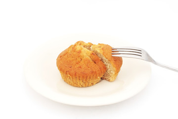 Banana cup cake on plate with fork