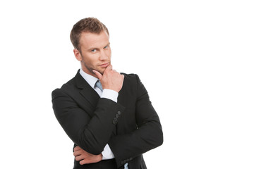 Confident businessman. Portrait of cheerful young businessman lo