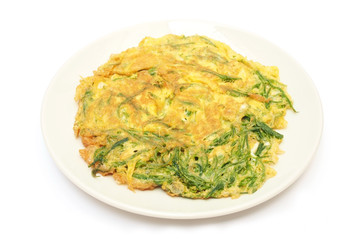 Fried Acacia Pennata with beaten egg (cha-om kai in Thai)