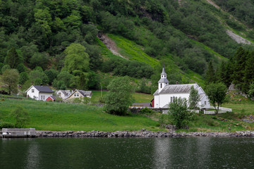 Small church in the Norwegian countryside © kvitkafabian