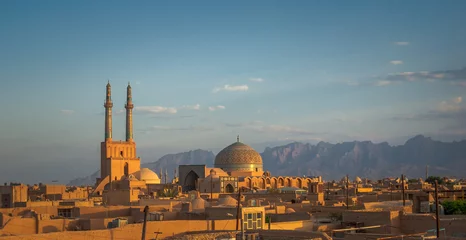  Zonsondergang over de oude stad Yazd, Iran © javarman