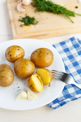Young boiled potatoes with dill
