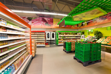 shelves with products in the supermarket - 56398175
