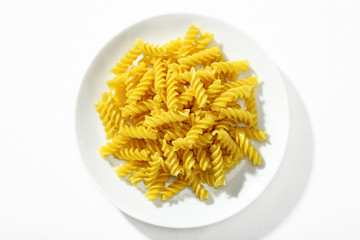 Looking down at a plate of properly cooked pasta