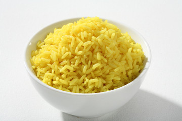 Cooked yellow rice in a bowl
