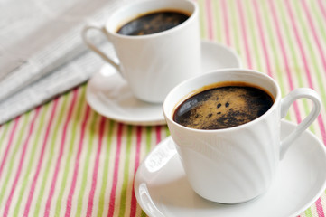 Two cups of morning coffee