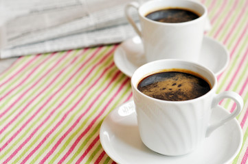 Two cups of morning coffee
