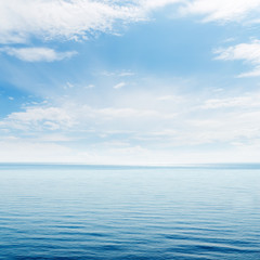 blue sea and clouds in sky