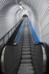 Fototapeta premium Upward view of an escalator