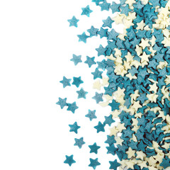 Candy stars decoration over white background with copyspace