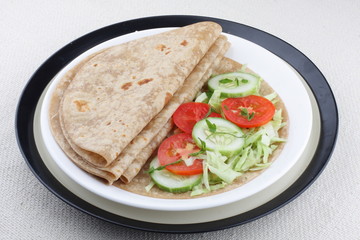 Fresh homemade chapati  with fresh vegetables.