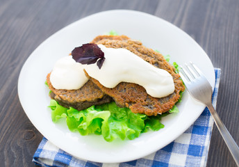 Potato pancake with sour cream