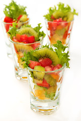 Fresh fruit salad in glasses