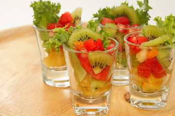 Fresh fruit salad in glasses