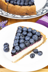 Blueberry pie. Slice of cake with blueberries on top